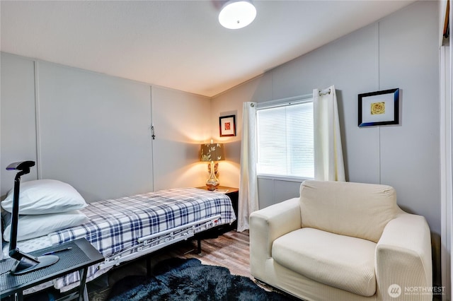 8760 State Highway 303 NE Unit C, Bremerton, WA 98311 - bedroom featuring vaulted ceiling and wood finished floors
