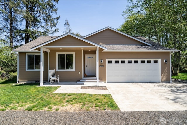 464 Dolphin Ave NE, Ocean Shores, WA 98569 - view of front of home featuring a garage, a front lawn, concrete driveway, and roof with shingles