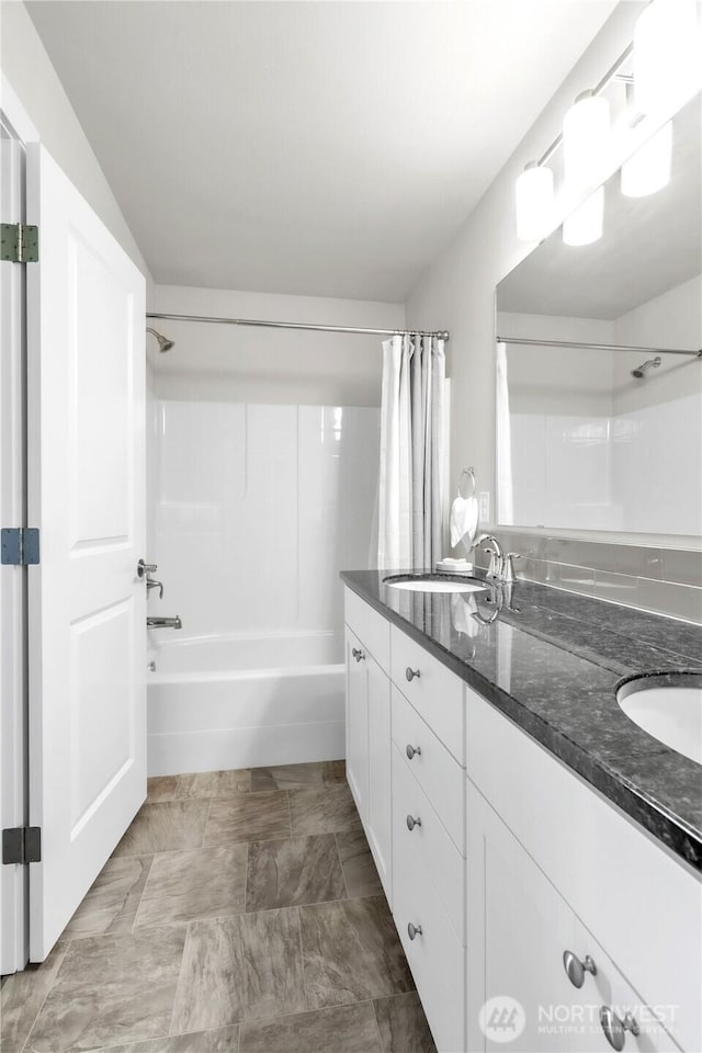 464 Dolphin Ave NE, Ocean Shores, WA 98569 - bathroom featuring double vanity, a sink, and shower / bath combo