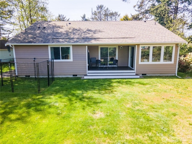 464 Dolphin Ave NE, Ocean Shores, WA 98569 - back of house featuring a yard, crawl space, fence, and roof with shingles
