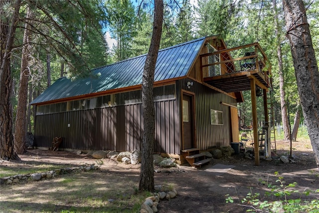 43 Arnica Ln, Twisp, WA 98856 - view of side of property with metal roof and entry steps