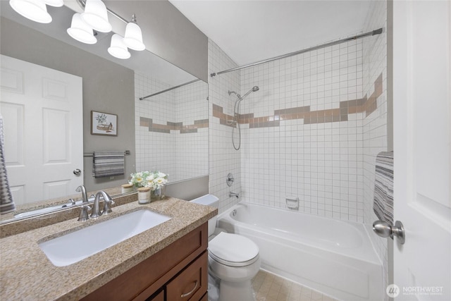 full bath featuring vanity, toilet, and shower / washtub combination