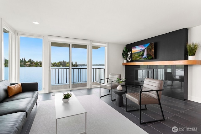 living room featuring tile patterned flooring and recessed lighting