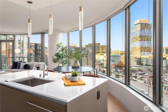 2510 6th Ave Unit 602, Seattle, WA 98121 - sunroom / solarium with a sink and a city view