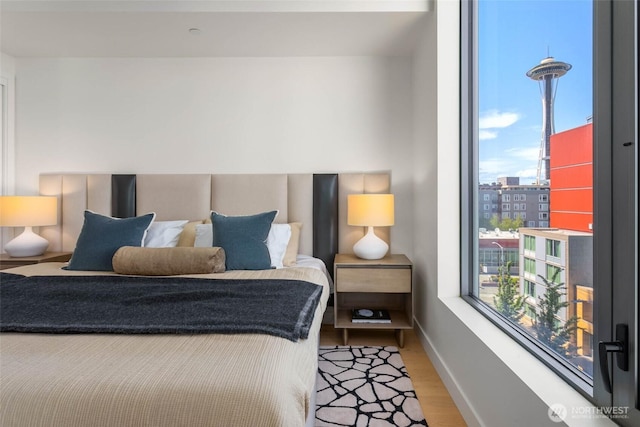 2510 6th Ave Unit 602, Seattle, WA 98121 - bedroom featuring light wood-style floors and baseboards
