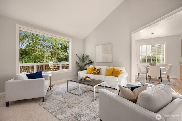 1893 Commodore Ln NW, Bainbridge Island, WA 98110 - living area featuring baseboards and high vaulted ceiling