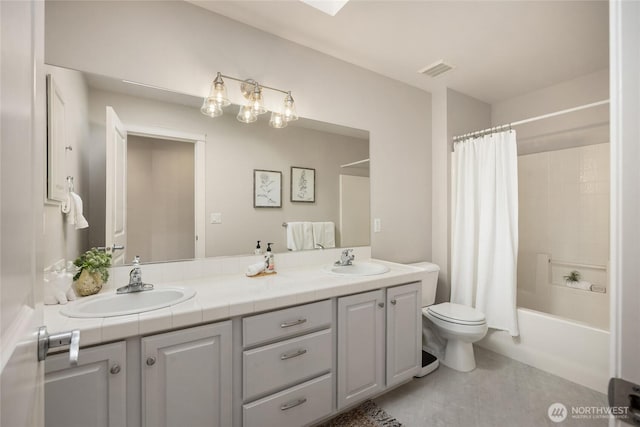 1893 Commodore Ln NW, Bainbridge Island, WA 98110 - full bath featuring double vanity, toilet, and shower / bath combination with curtain