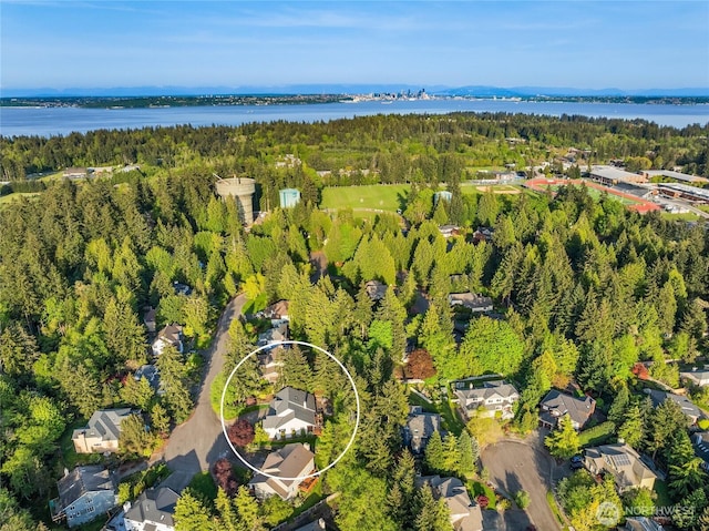 1893 Commodore Ln NW, Bainbridge Island, WA 98110 - aerial view of residential area featuring a forest and a large body of water