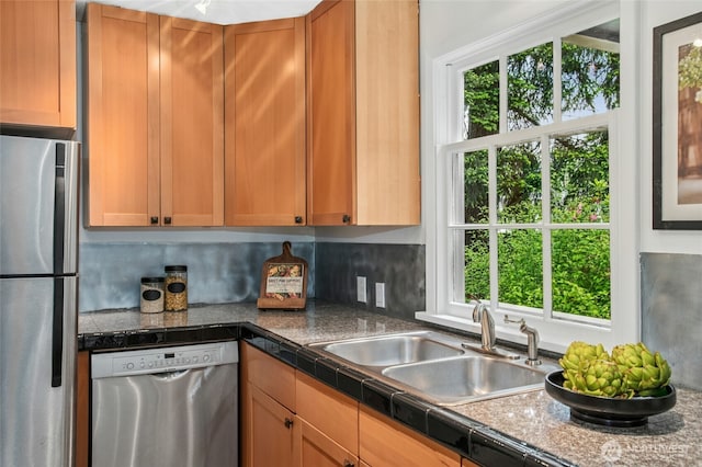 10515 NE 189th St, Bothell, WA 98011 - kitchen with stainless steel appliances, a sink, healthy amount of natural light, and dark countertops