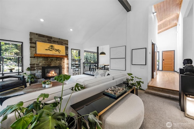 5107 23rd Ave W, Everett, WA 98203 - living area with carpet floors, high vaulted ceiling, a wealth of natural light, and a stone fireplace
