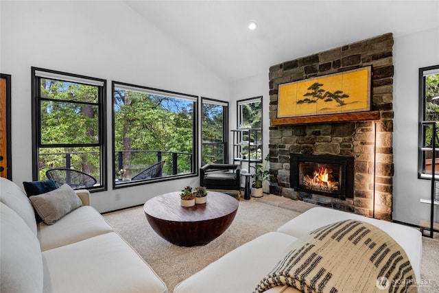 5107 23rd Ave W, Everett, WA 98203 - living room featuring high vaulted ceiling, carpet flooring, and a stone fireplace