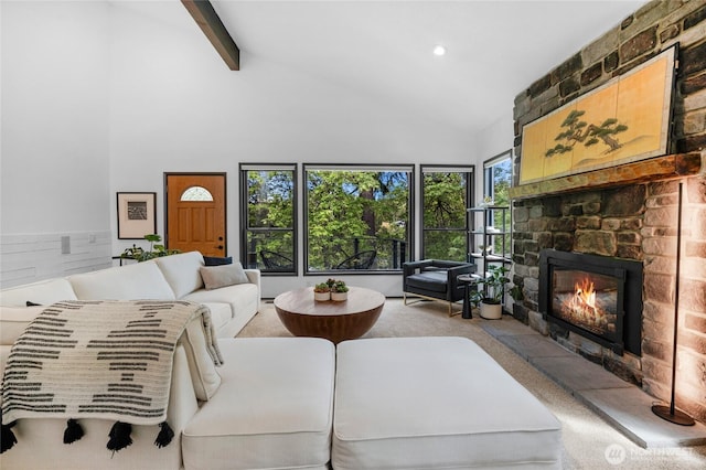 5107 23rd Ave W, Everett, WA 98203 - carpeted living room with beamed ceiling, high vaulted ceiling, and a fireplace