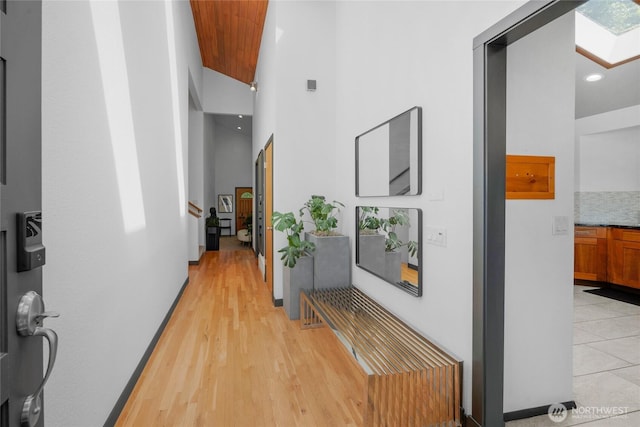 5107 23rd Ave W, Everett, WA 98203 - hall featuring light wood-style floors, recessed lighting, baseboards, and a towering ceiling