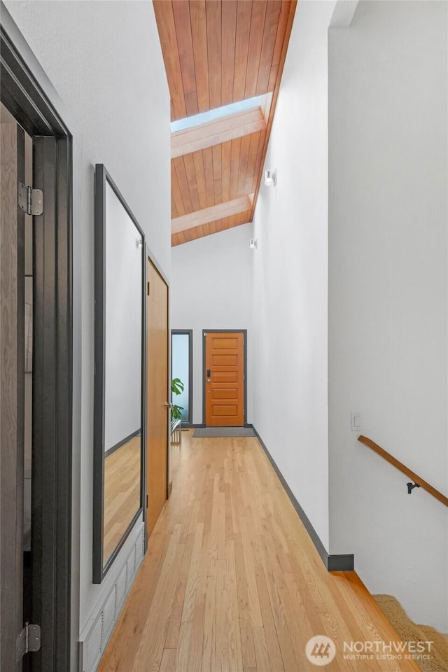 5107 23rd Ave W, Everett, WA 98203 - corridor featuring light wood-type flooring, lofted ceiling with beams, and wood ceiling