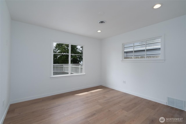 5310 Sunset Ave, Anacortes, WA 98221 - spare room featuring wood finished floors and recessed lighting