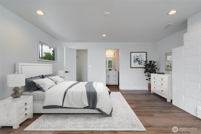 5310 Sunset Ave, Anacortes, WA 98221 - bedroom with dark wood finished floors, recessed lighting, and ensuite bath