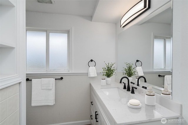 5310 Sunset Ave, Anacortes, WA 98221 - bathroom with vanity and tile walls