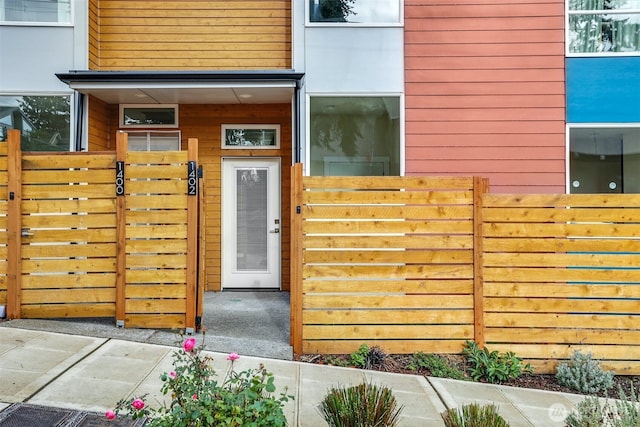 entrance to property with fence and a gate
