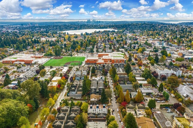 aerial view featuring a water view and a residential view