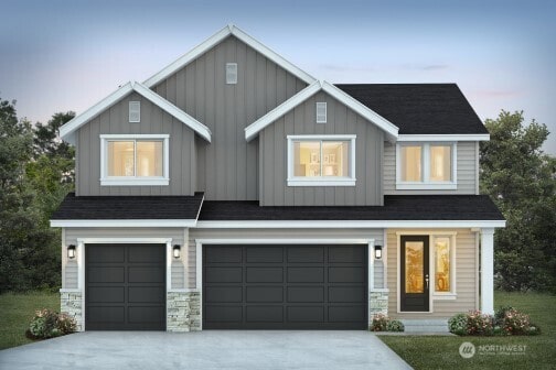 12402 40th Ave NW, Gig Harbor, WA 98332 - view of front facade with a garage, board and batten siding, and concrete driveway
