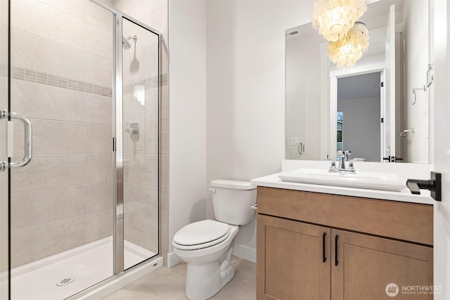12402 40th Ave NW, Gig Harbor, WA 98332 - full bathroom featuring an inviting chandelier, vanity, toilet, baseboards, and a stall shower
