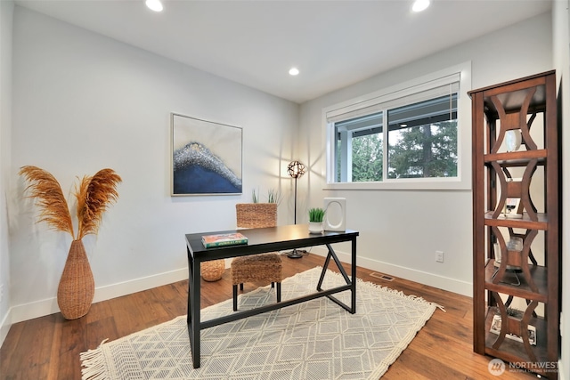 office space with wood finished floors, visible vents, baseboards, and recessed lighting