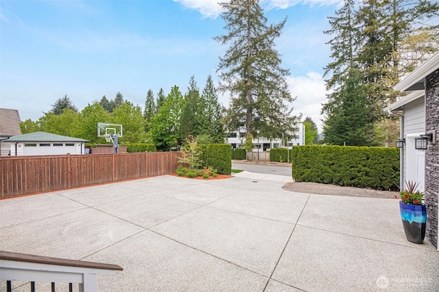 view of patio / terrace featuring fence