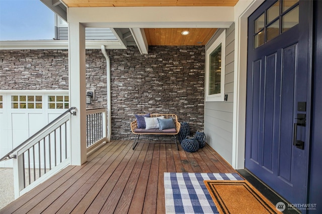 wooden terrace featuring a porch