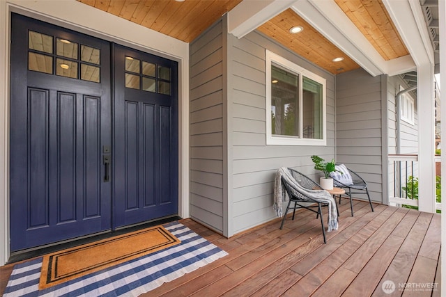 entrance to property with covered porch