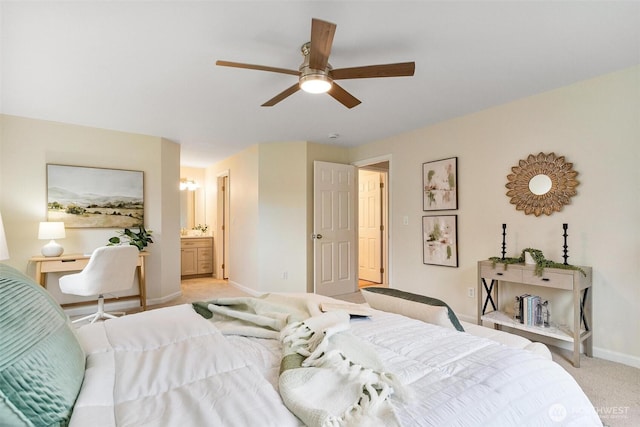 bedroom with baseboards, ceiling fan, connected bathroom, and light colored carpet