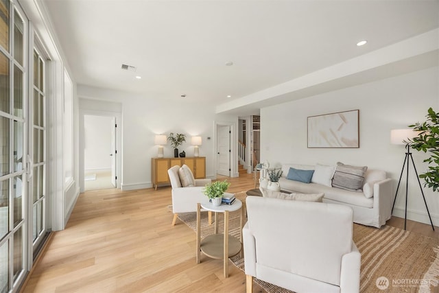 4815 Rosalind Rd NE, Bainbridge Island, WA 98110 - living area featuring light wood finished floors, baseboards, and recessed lighting
