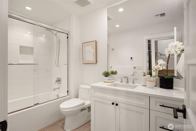 4815 Rosalind Rd NE, Bainbridge Island, WA 98110 - full bath featuring toilet, tile patterned floors, vanity, enclosed tub / shower combo, and recessed lighting