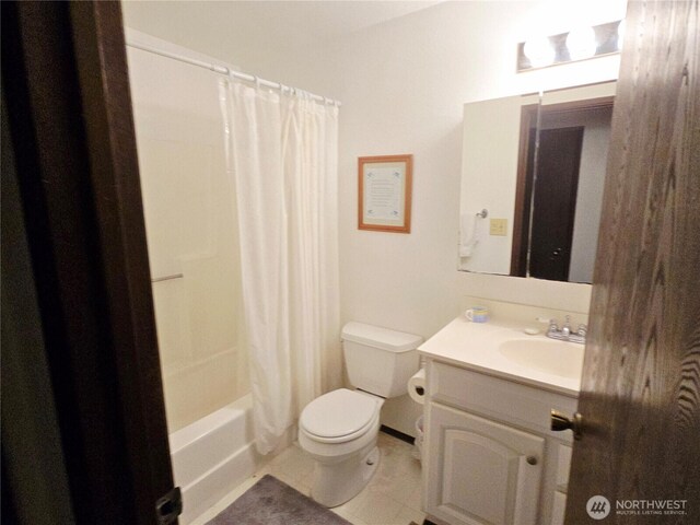 bathroom featuring vanity, shower / bathtub combination with curtain, tile patterned flooring, and toilet