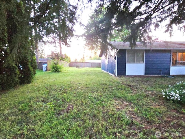 view of yard with fence