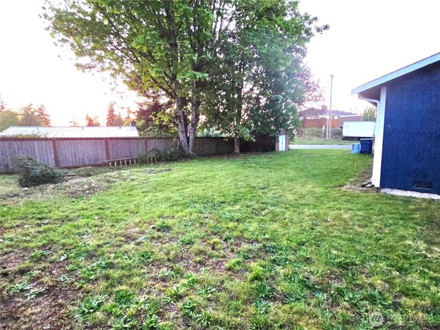view of yard featuring fence