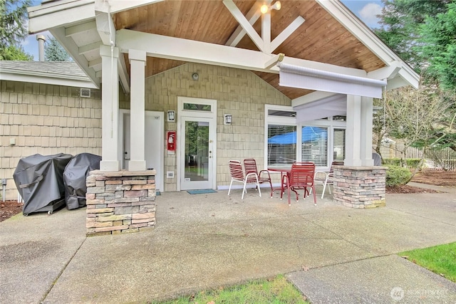 view of patio / terrace featuring covered porch and a grill