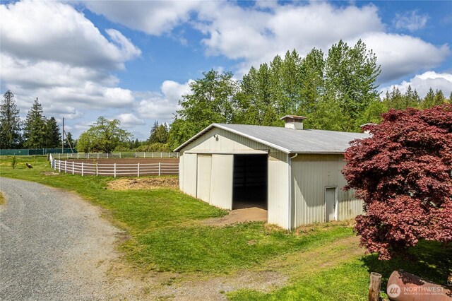 28405 59th Ave NE, Arlington, WA 98223 - view of pole building featuring fence and a lawn