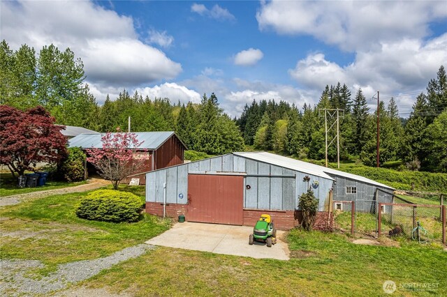 28405 59th Ave NE, Arlington, WA 98223 - view of pole building featuring fence and a lawn