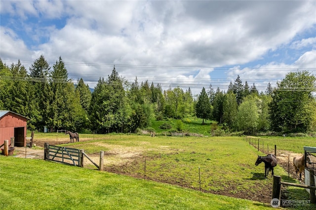 28405 59th Ave NE, Arlington, WA 98223 - view of property's community featuring a yard, a rural view, an outdoor structure, and fence
