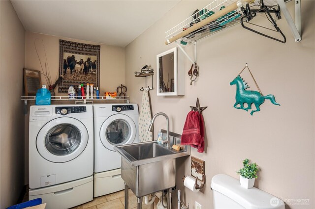 28405 59th Ave NE, Arlington, WA 98223 - laundry room featuring washer and dryer, laundry area, and a sink