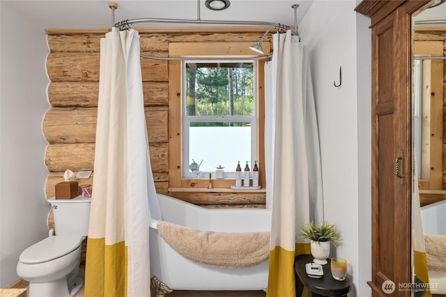 doorway featuring rustic walls