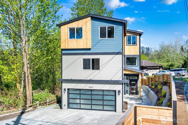 5732 Halls Lake Way, Lynnwood, WA 98036 - exterior space with fence, an attached garage, and driveway
