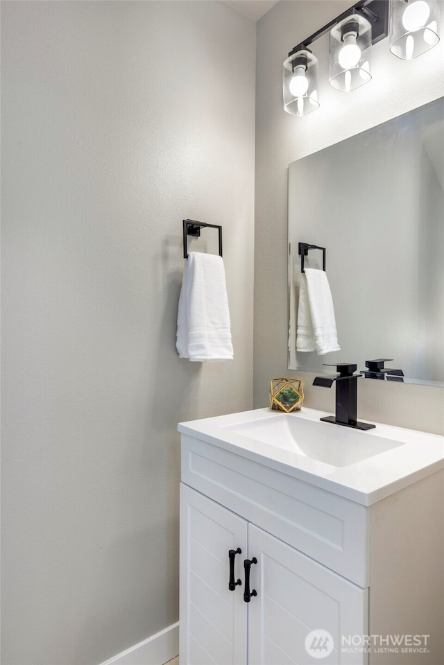 5732 Halls Lake Way, Lynnwood, WA 98036 - bathroom with baseboards and vanity