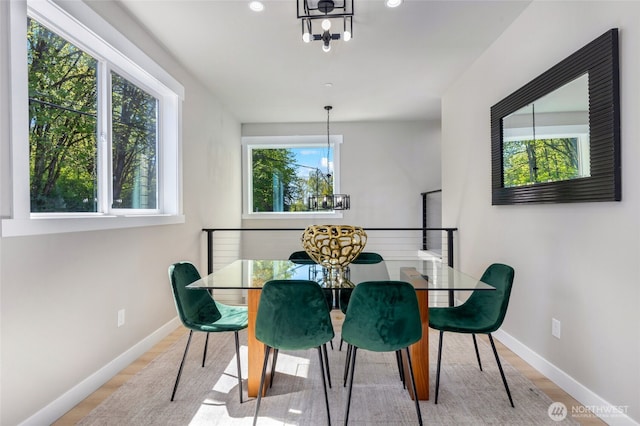 5732 Halls Lake Way, Lynnwood, WA 98036 - dining area with recessed lighting, baseboards, a notable chandelier, and wood finished floors