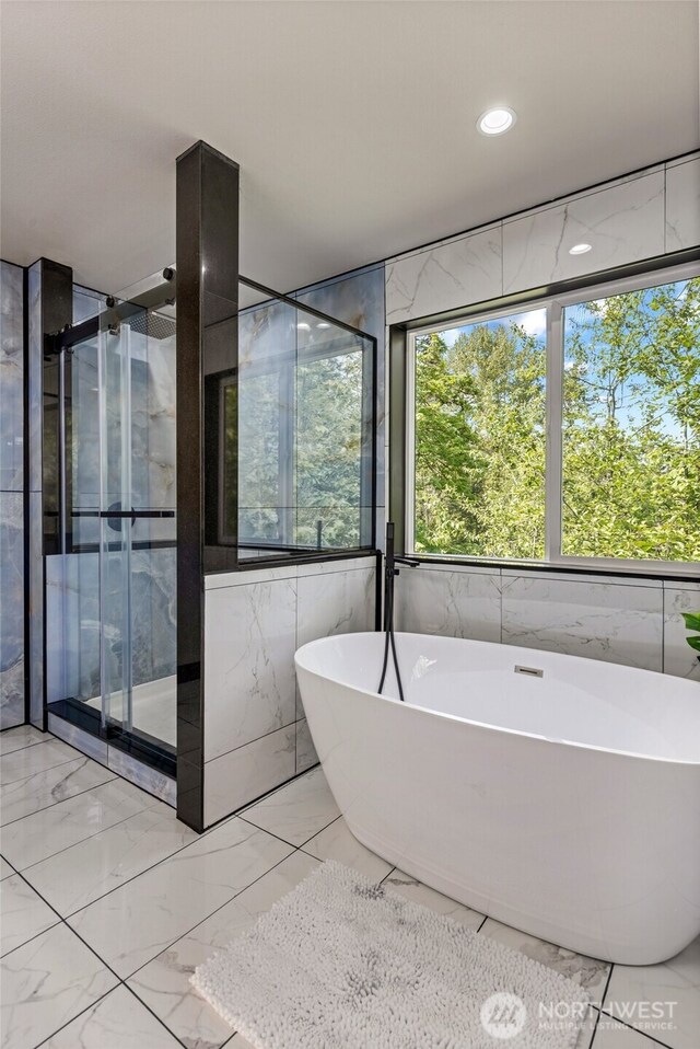5732 Halls Lake Way, Lynnwood, WA 98036 - full bathroom featuring marble finish floor, tile walls, recessed lighting, a soaking tub, and a shower stall