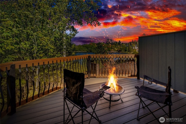 5732 Halls Lake Way, Lynnwood, WA 98036 - deck at dusk featuring an outdoor fire pit
