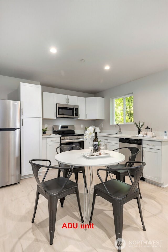 5732 Halls Lake Way, Lynnwood, WA 98036 - dining room with recessed lighting