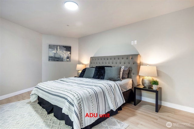 5732 Halls Lake Way, Lynnwood, WA 98036 - bedroom featuring baseboards and wood finished floors