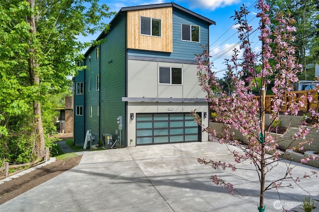 5732 Halls Lake Way, Lynnwood, WA 98036 - view of front facade featuring concrete driveway and a garage