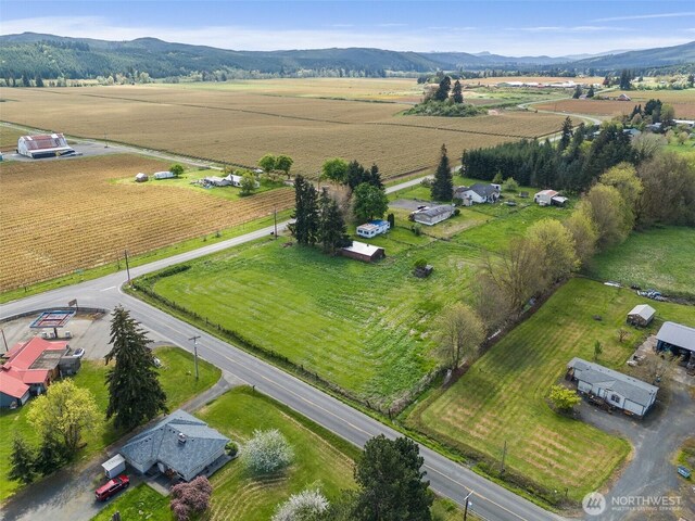 drone / aerial view with a rural view and a mountain view